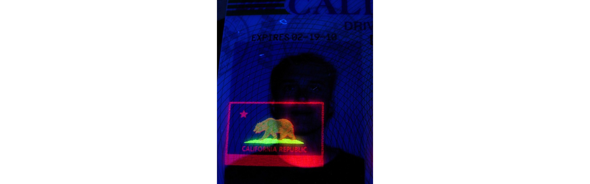 https://www.fakeidwebsite.com/image/cache/catalog/Blog/Blog%20Posts/Fake%20ID%20Holograms%20Legit-1920x600.jpg