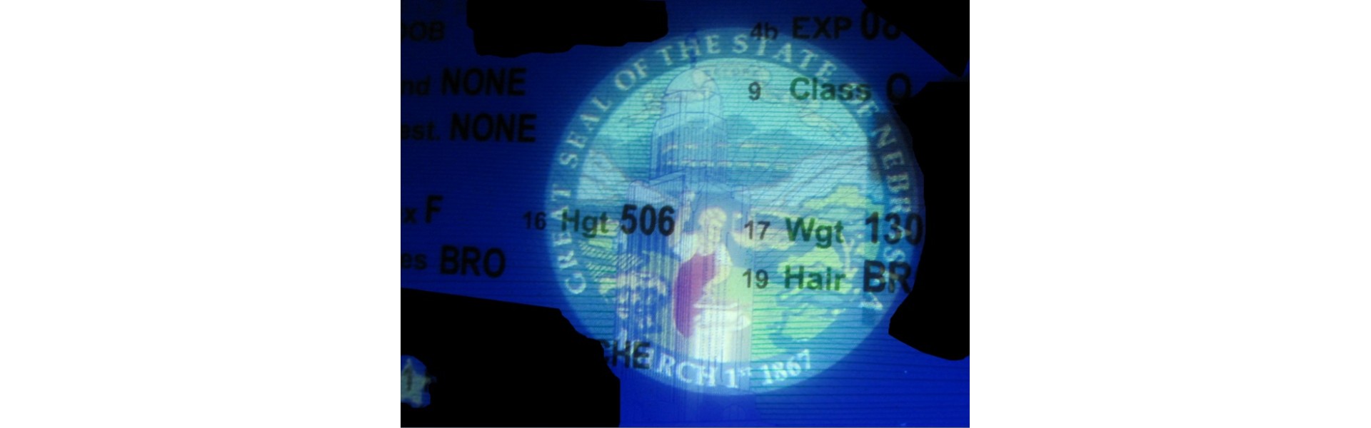 https://www.fakeidwebsite.com/image/cache/catalog/Blog/Blog%20Posts/Fake%20ID%20UV%20Light-1920x600.jpg